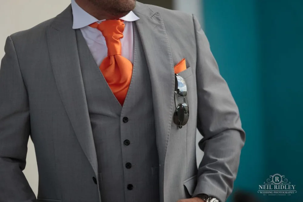 Grooms Grey suit outside The Big Blue Hotel in Blackpool