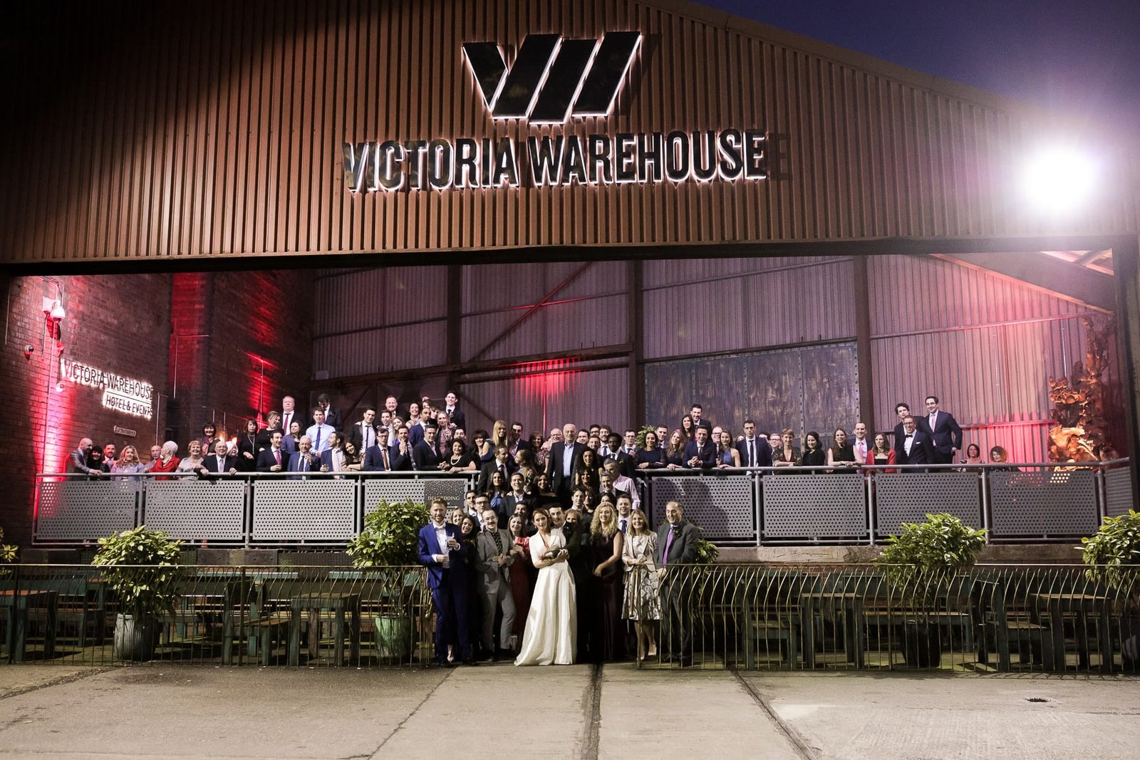 Victoria Warehouse Group Shot on patio