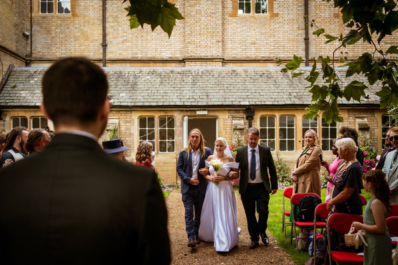 Le Gothique Wedding walking down the aisle