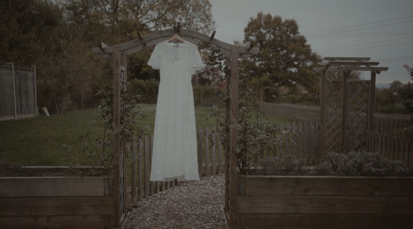 Bunkers Barn Wedding Video Hanging Dress